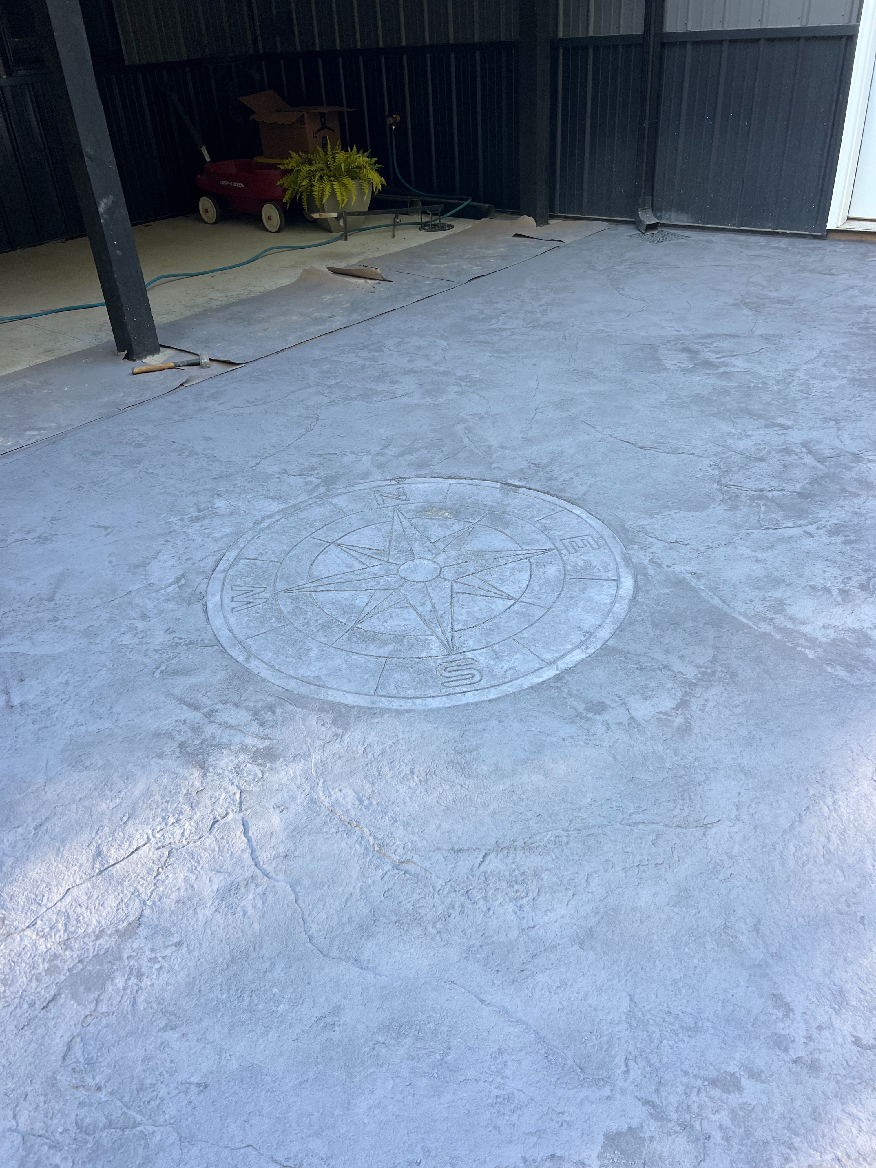 Stamped and Colored Concrete Patio installation in Delton Michigan